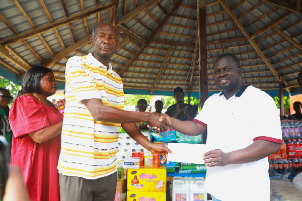 GJA president, Albert Kwabena  Dwumfour donating to some orphanage homes.