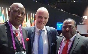 ZIFA president Philip Chiyangwa (left) poses for a picture with new FIFA president Gianni Infantino