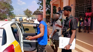 Photo of the suspects exiting the court premises