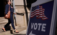 A sign directs voters to early voting in Providence, Rhode Island