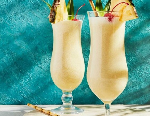 Pina Colada is made with rum, coconut cream, and pineapple juice