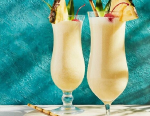 Pina Colada is made with rum, coconut cream, and pineapple juice