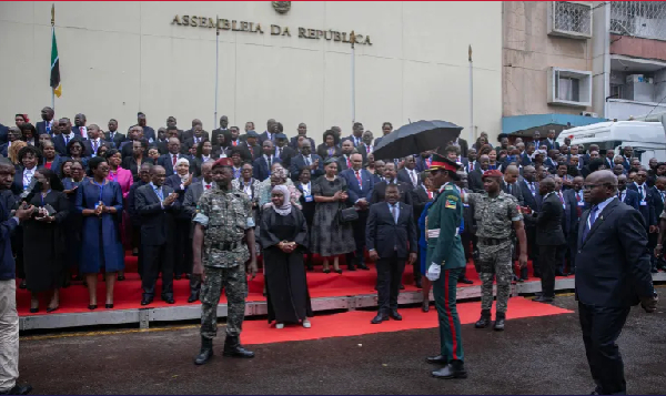 Members of parliament prepare to take the official photograph following the swearing-in ceremony