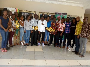 Game Boy in a group picture with staff of Gaming Commission of Ghana