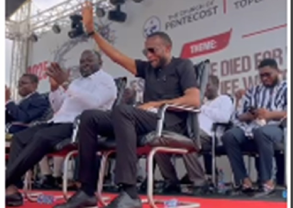 The MP (in black shirt) fellowshipping with Christians