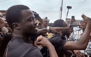 A photo of the irate family members of the late immigration officer