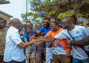 Dr Mahamudu Bawumia exchanging pleasantries with some of the supporters