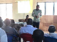 Louis Osei Owusu making a presentation on the budget