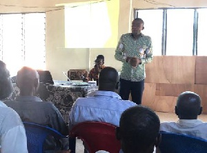 Louis Osei Owusu making a presentation on the budget