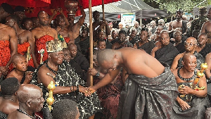 Lawyer Nana Agyei Baffour Awuah (R) shaking hands with Otumfuo