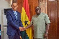 Dr Rudy Moise (L) with Ghana's Chief of Staff, Julius Debrah (R)