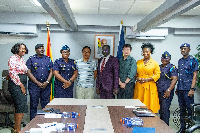 The team in a pose for a picture after the meeting