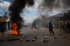 People protest in the streets of Arusha, Tanzania during its election