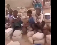 A screenshot of the viral video pupils sitting on blocks to study in Sawla-Tuna-Kalba