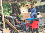 Bishop Abraham Aidoo (in blue) teaching some of the residents