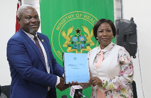 Professor Dr Grace Ayensu-Danquah (R) received the committee's finding on behalf of the minister