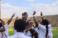 Black Queens coach, Nora Hauptle celebrating WAFCON qualification with her players