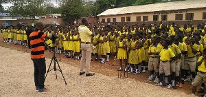 A member of the team addressing pupils at the Ejisu Methodist Preparatory and Junior High School