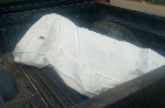 A file photo of the body of 35-year-old man and his pregnant wife