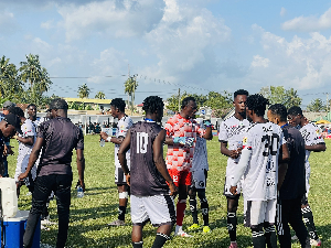 All Blacks players (in white jersey) refreshed themselves during the coolig break