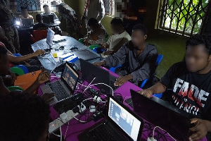 Some of the arrested scammers are in custody