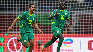 Mane (R) celebrating the goal with his teammate