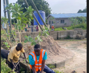 Some residents of the community engaging in the clean-up exercise