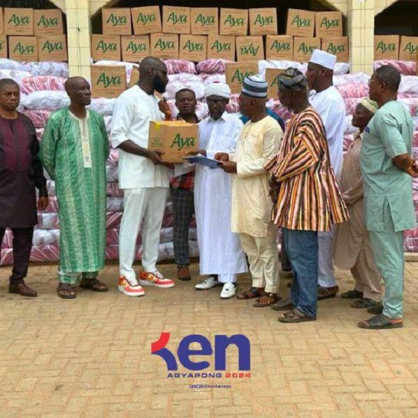 Kennedy Agyapong Jnr making the presentation on behalf of his father