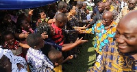 President Akufo-Addo shaking hands at the Kumasi Academy's anniversary celebration
