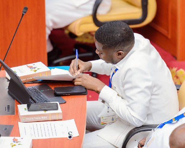 Eric Edem Agbana on the floor of Parliament on his first day