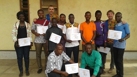 Participants in group picture with their certificates