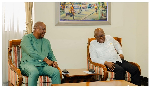 President John Dramani Mahama (L) with former President Nana Addo Dankwa Akufo-Addo