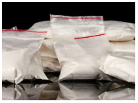 Methamphetamine are displayed at a news conference to show the state's largest meth bust in history