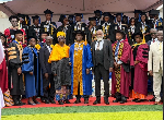 File photo of the graduates and the management of the school