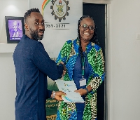 Nana Akwasi Ankamah - Managing Director (RMG), left, shaking hands with Prof. Rita Akosua Dickson Vi