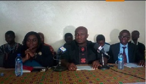 Dr. Eric Opoku Mensah (middle) addressing the news conference at Cape Coast