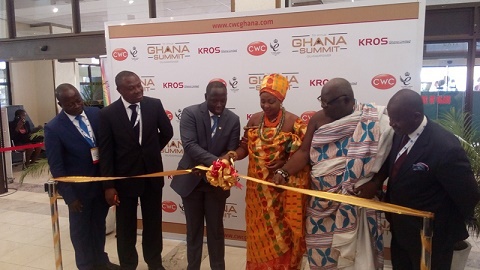 Mr Emmanuel Armah-Kofi Buah (3rd left) cutting the tape to formally launch the Ghana Summit
