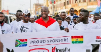 Herbert Mensah leads a May 9 procession in Accra