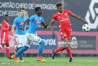 Abdallah Basit challenging Benfica player during a Uefa Youth League game