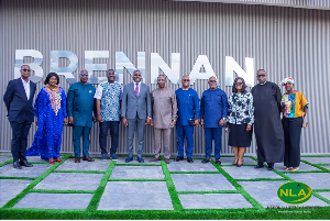 Director-General of NLA, Samuel Awuku and some board members at NLA in a group picture