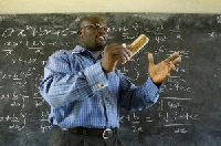 A teacher teaching his students