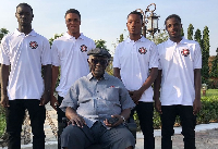 Former Ghanaian President John Agyekum Kufuor and some KFA players (in white)