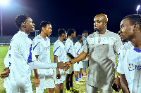Edudzi Tamakloe (in kaftan) engaged the players before the game started