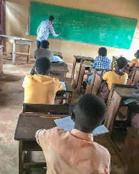Dr Adutwum teaching a class during his unannounced visit