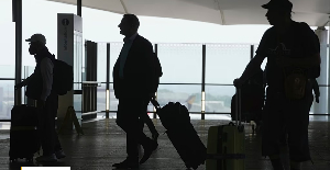 Passengers walk at the Heathrow Airport, in London Saturday, May 27, 2023