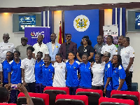 Ghana’s Mini Football national team in a photograph with sports management