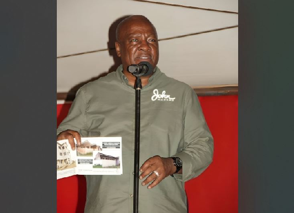 Former President John Dramani Mahama endorsing the book