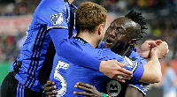 Dominic Oduro mobbed by team mates