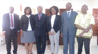 Madam Gloria Akuffo (3rd right) in a group photo with the Committee Members