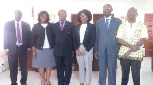 Madam Gloria Akuffo (3rd right) in a group photo with the Committee Members